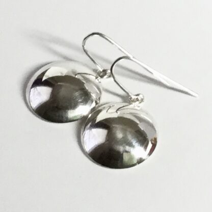 Sterling silver domed disk drop earrings