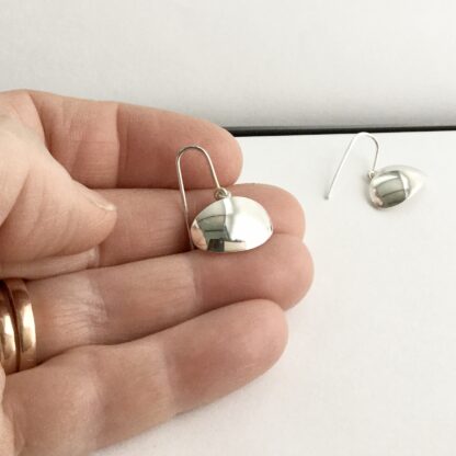 Sterling silver domed oval drop earrings