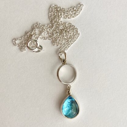 Silver and tear drop topaz necklace