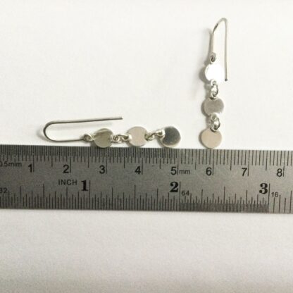 Sterling silver articulated disk drop earrings
