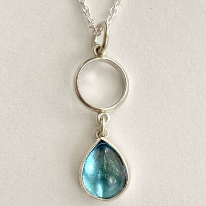 Silver and tear drop topaz necklace