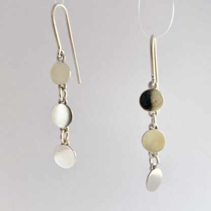 Sterling silver articulated disk drop earrings