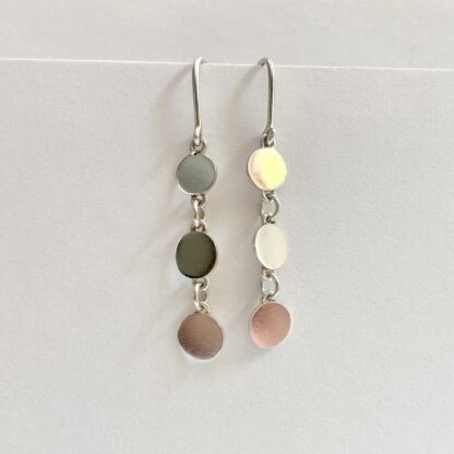 Sterling silver articulated disk drop earrings